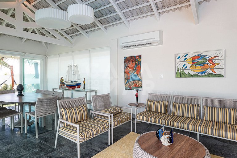 Linda casa com 9 suítes, pé na areia da praia